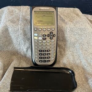 Texas Instruments TI-89 Titanium Graphing Calculator - Gray and Black